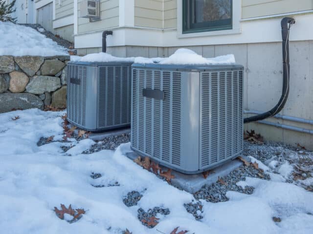 HVAC system of home during snowy winter